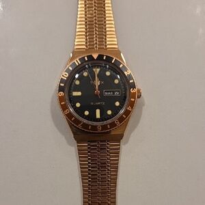 Timex Gold-Tone Watch with Black Dial